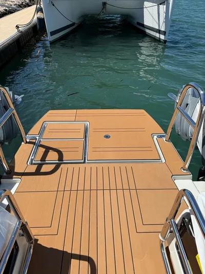  Yacht Photos Pics YOT 41 boat deck, 2025 model, docked on calm water.