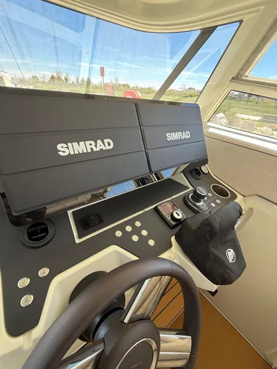  Yacht Photos Pics Helm of 2025 YOT 41 boat with dual Simrad displays and modern controls.