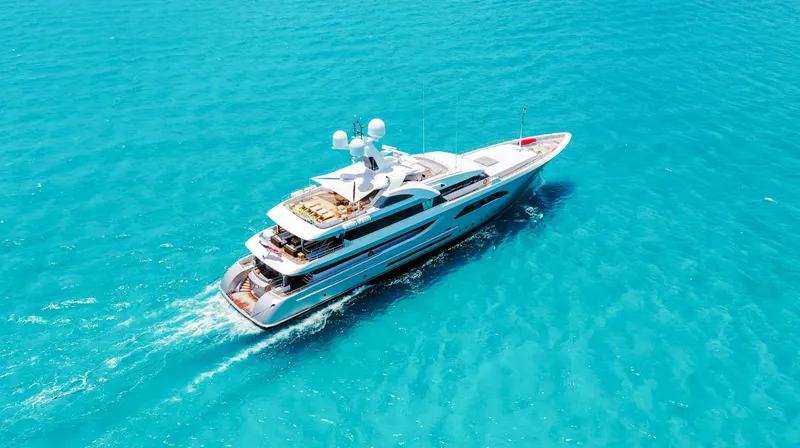 W Yacht Photos Pics Luxurious 2013 Feadship yacht cruising in clear turquoise waters.
