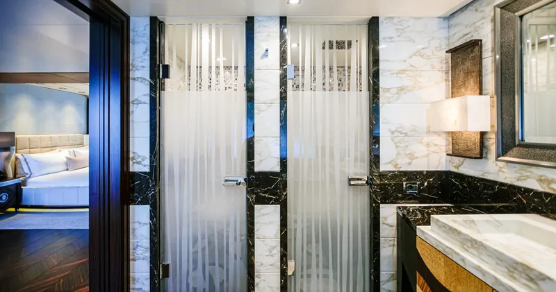 W Yacht Photos Pics Luxurious Feadship yacht bathroom with marble accents and frosted glass doors, 2013 model.