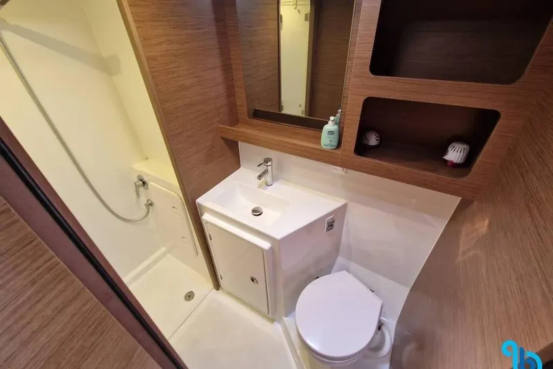  Yacht Photos Pics Modern bathroom in 2020 Lagoon 42 yacht with shower, sink, and toilet.