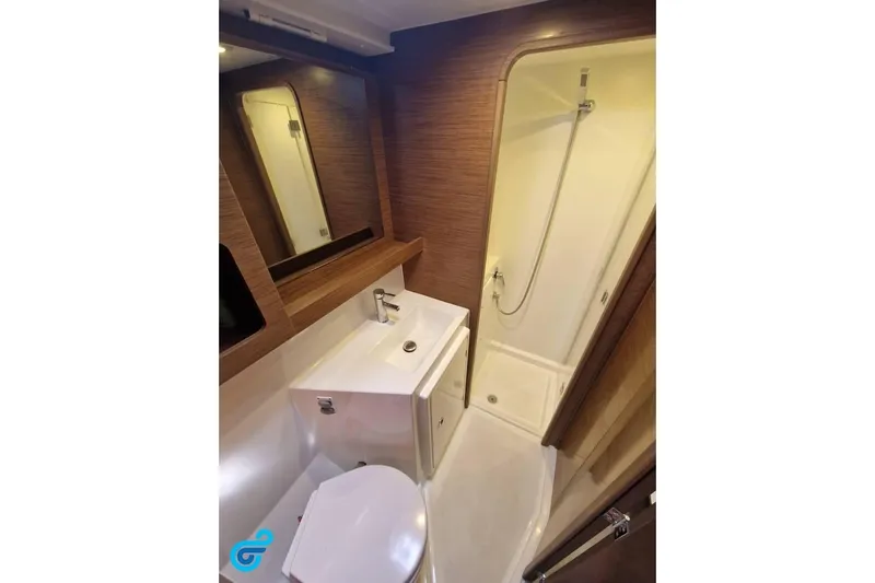 Yacht Photos Pics Modern bathroom in 2020 Lagoon 42 yacht with shower, sink, and toilet.