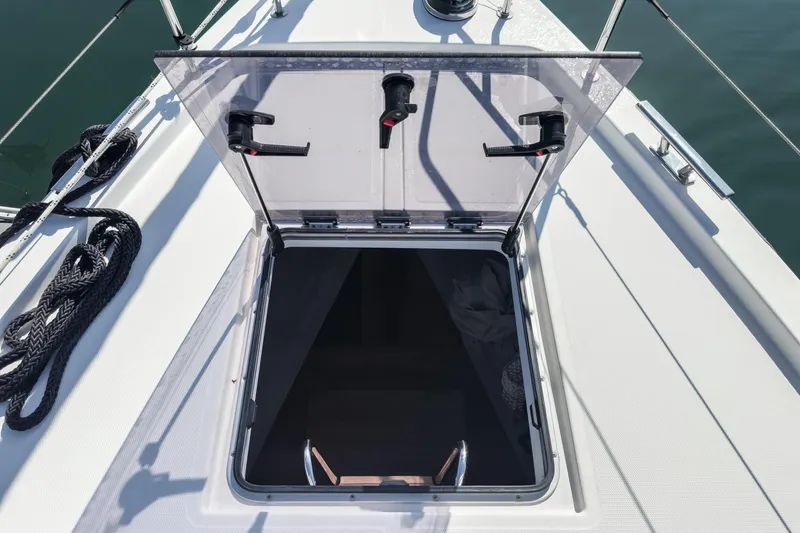Tuanis Yacht Photos Pics Open hatch on 2023 Bavaria C50 yacht deck, showing interior access.