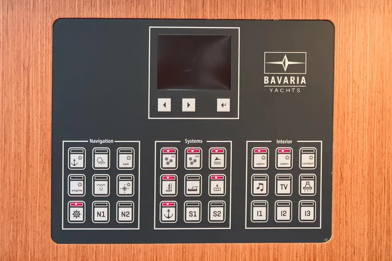 Tuanis Yacht Photos Pics Control panel of a 2023 Bavaria C50 yacht, featuring navigation, systems, and interior controls.