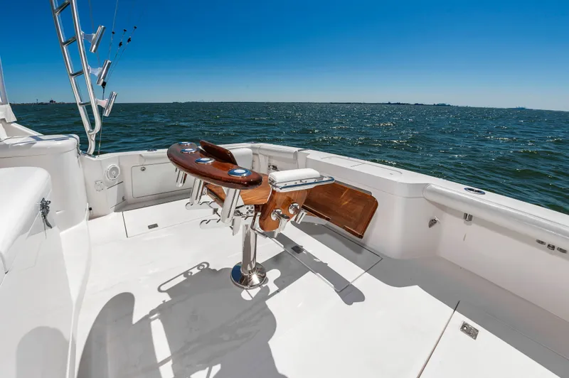 Salt Shaker Yacht Photos Pics Cabo 40 Express 2008 on open sea, fishing rod holders visible.