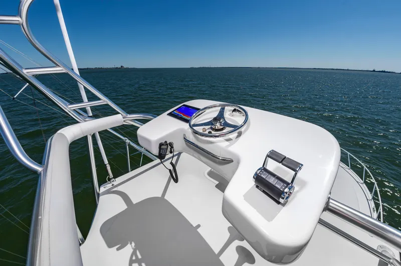 Salt Shaker Yacht Photos Pics Helm of 2008 Cabo 40 Express yacht on open sea.