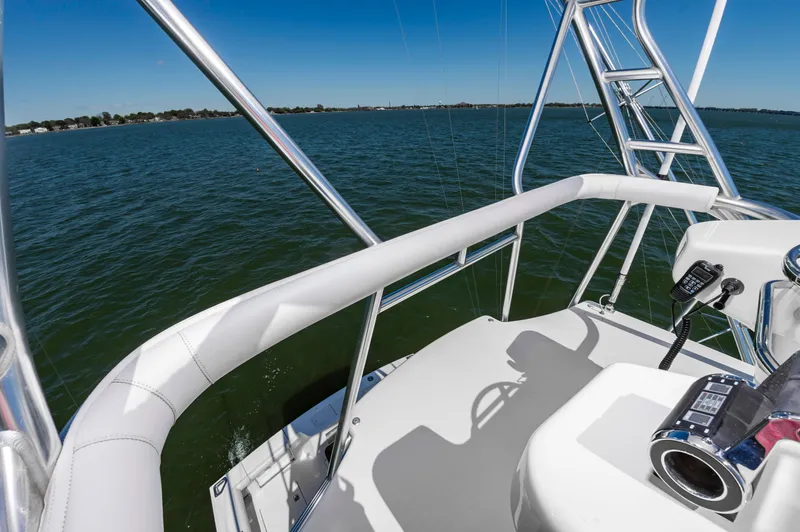 Salt Shaker Yacht Photos Pics Cabo 40 Express 2008 on water with helm station.