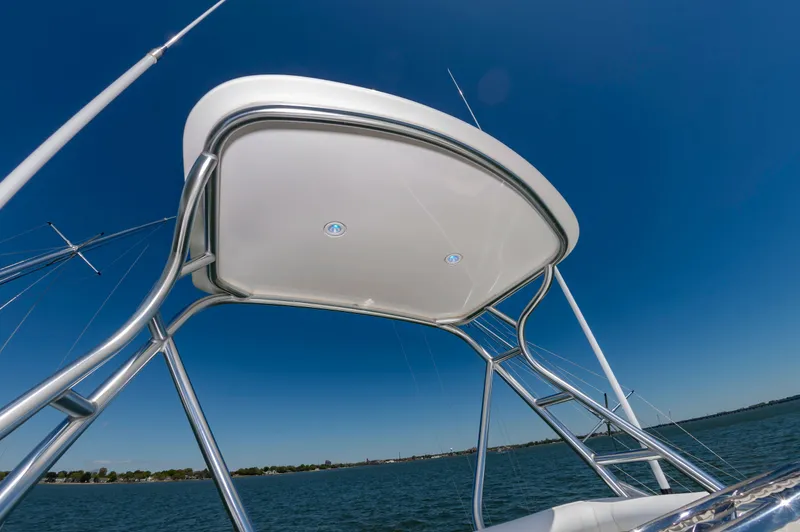 Salt Shaker Yacht Photos Pics Cabo 40 Express 2008 boat roof and ladder, blue sky.
