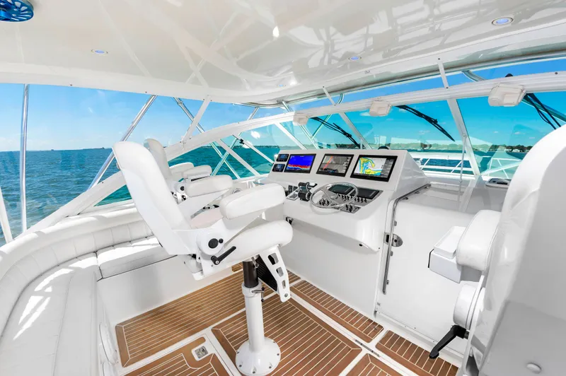 Salt Shaker Yacht Photos Pics Interior of 2008 Cabo 40 Express yacht with modern helm console.