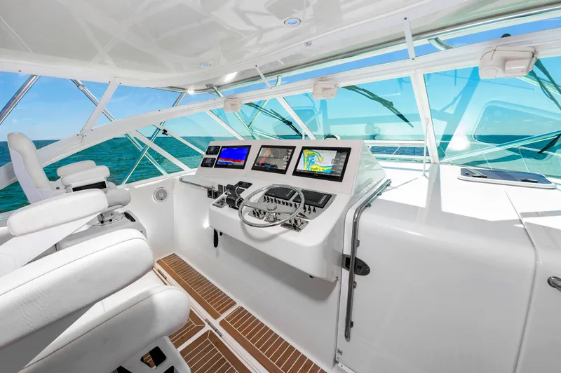 Salt Shaker Yacht Photos Pics Interior of 2008 Cabo 40 Express yacht with modern helm console.