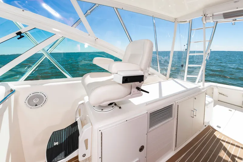 Salt Shaker Yacht Photos Pics Interior of 2008 Cabo 40 Express yacht with captain's chair.