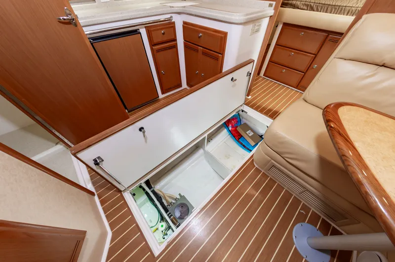Salt Shaker Yacht Photos Pics Interior of 2008 Cabo 40 Express with open floor hatch.