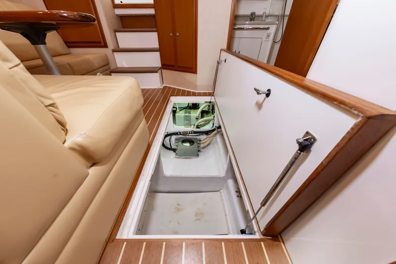 Salt Shaker Yacht Photos Pics Interior of 2008 Cabo 40 Express with open floor compartment.