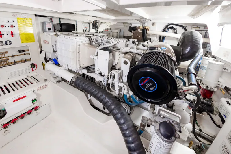 Salt Shaker Yacht Photos Pics Engine room of 2008 Cabo 40 Express with detailed machinery.