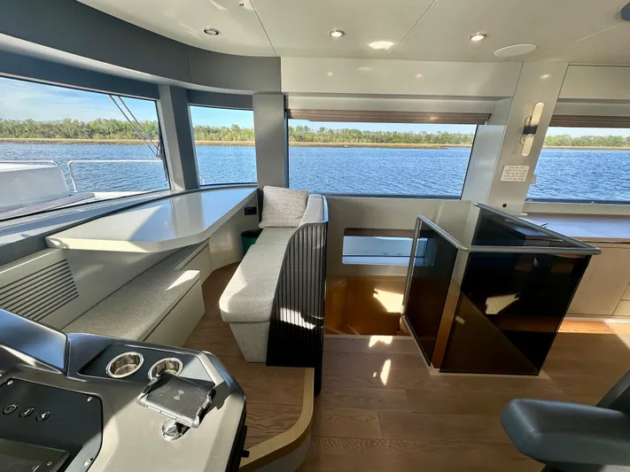  Yacht Photos Pics Luxurious interior of 2024 Sirena 68 yacht with panoramic water views.