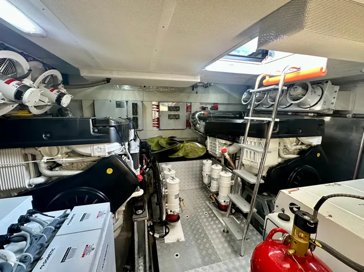  Yacht Photos Pics Engine room of 2024 Sirena 68 yacht, featuring modern equipment and organized layout.
