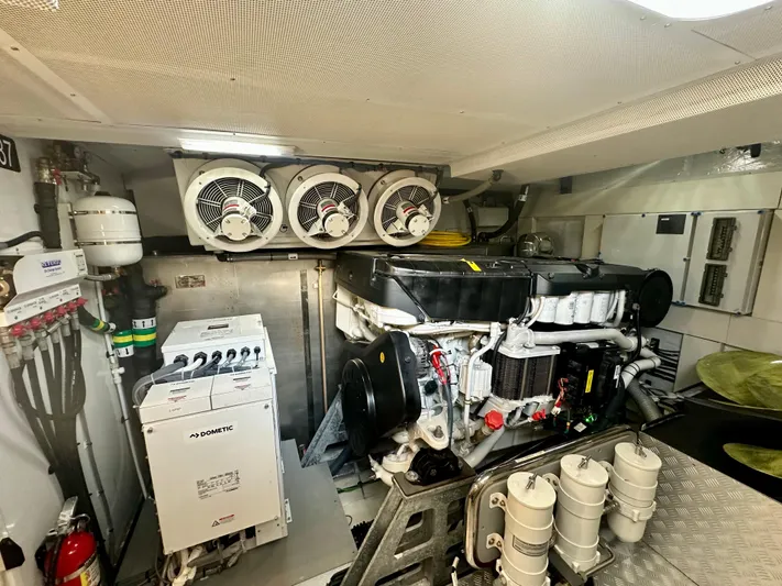  Yacht Photos Pics Engine room of 2024 Sirena 68 yacht, featuring advanced machinery and ventilation systems.