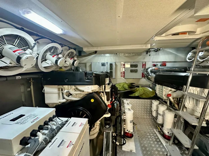  Yacht Photos Pics Engine room of 2024 Sirena 68 yacht, featuring advanced machinery and ventilation systems.
