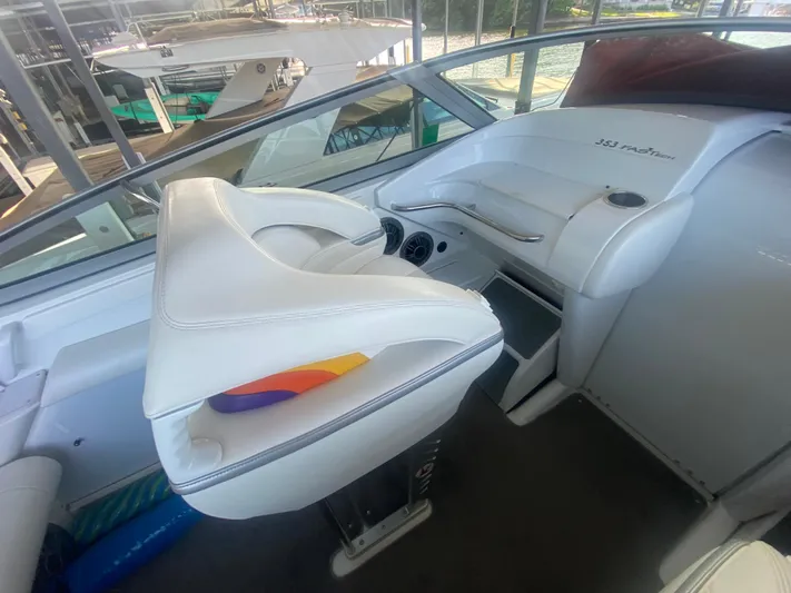  Yacht Photos Pics 2006 Formula 353 FASTech boat interior with white seating and dashboard.