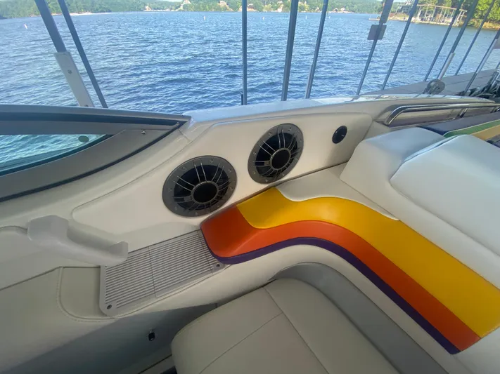  Yacht Photos Pics 2006 Formula 353 FASTech boat interior with colorful seating and lake view.