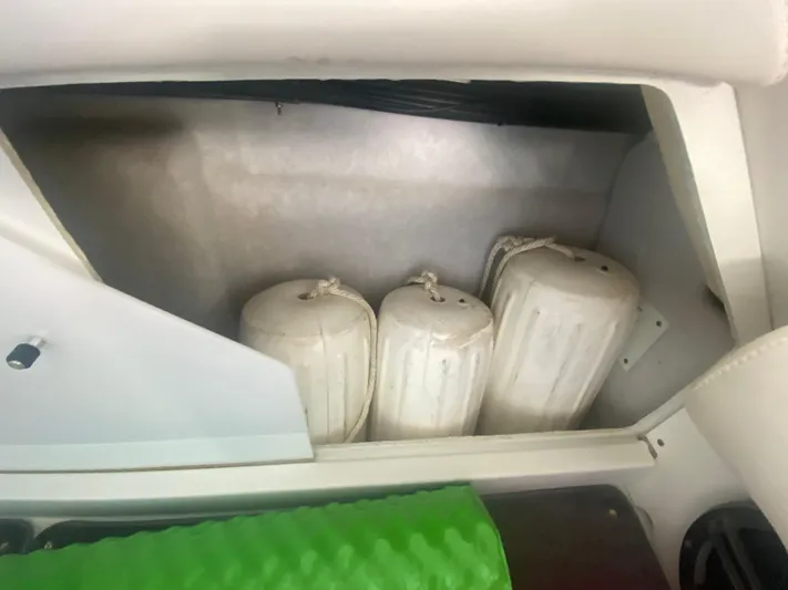  Yacht Photos Pics Storage compartment with boat fenders in a 2006 Formula 353 FASTech.
