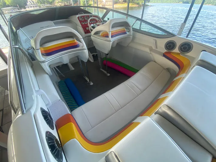  Yacht Photos Pics 2006 Formula 353 FASTech boat interior with colorful seating and lake view.