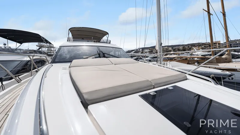  Yacht Photos Pics Luxurious 2019 Princess F49 yacht with spacious deck, docked at marina.