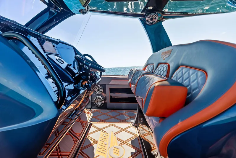 Casual Acquaintance Yacht Photos Pics 2024 Deep Impact 399 Sport boat interior with luxury seating and modern dashboard.