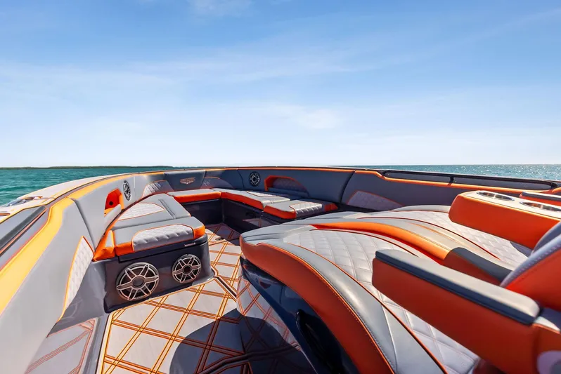 Casual Acquaintance Yacht Photos Pics 2024 Deep Impact 399 Sport boat interior with luxurious seating and ocean view.