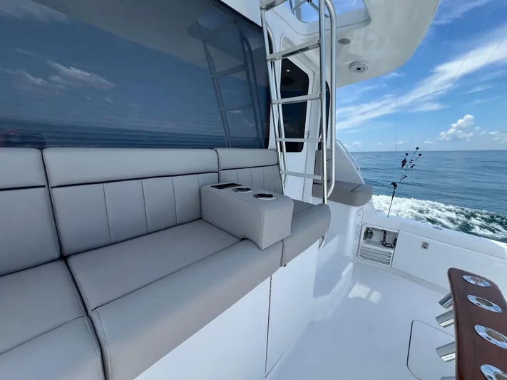  Yacht Photos Pics Luxurious seating on 2001 Ocean 52 Convertible yacht with ocean view.