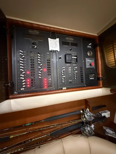 Side Chick Yacht Photos Pics Electrical control panel on a 2002 Rampage 38 Express boat.