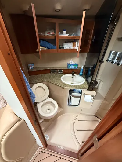 Side Chick Yacht Photos Pics Rampage 38 Express 2002 bathroom with sink and toilet.