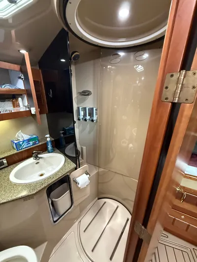Side Chick Yacht Photos Pics Rampage 38 Express 2002 bathroom with shower and sink.