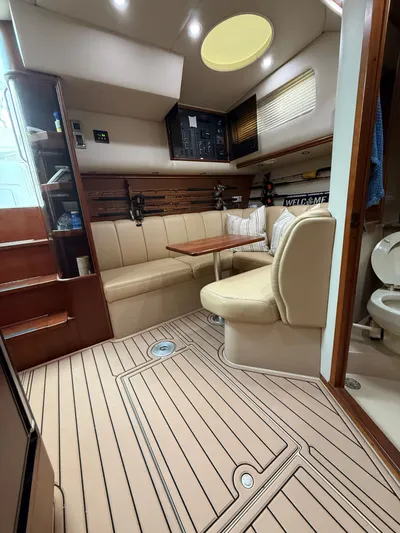 Side Chick Yacht Photos Pics Interior of 2002 Rampage 38 Express yacht.
