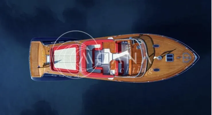 Temtation Yacht Photos Pics Overhead view of 2011 J Craft Torpedo R 42 luxury yacht on water.