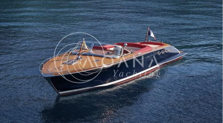 Temtation Yacht Photos Pics Luxurious 2011 J Craft Torpedo R 42 yacht on serene blue waters.