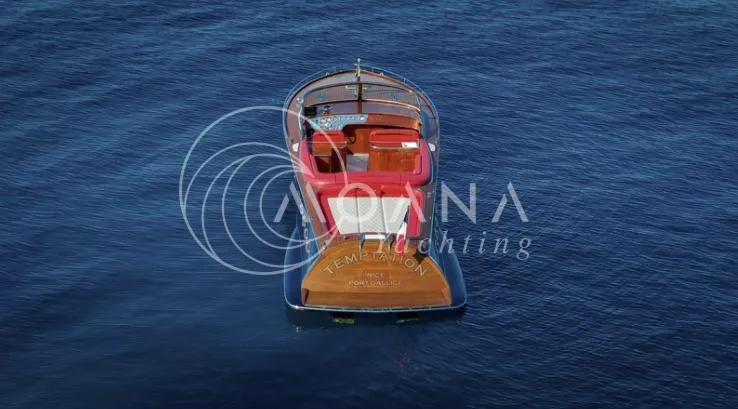 Temtation Yacht Photos Pics Luxurious 2011 J Craft Torpedo R 42 yacht on serene blue waters.