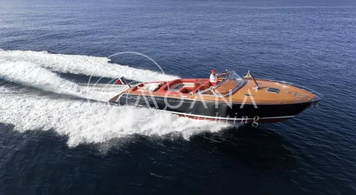 Temtation Yacht Photos Pics Luxurious 2011 J Craft Torpedo R 42 yacht cruising on open water.