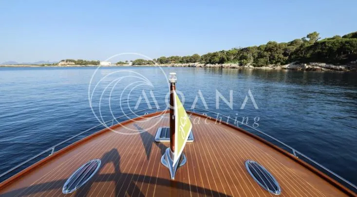 Temtation Yacht Photos Pics Bow view of 2011 J Craft Torpedo R 42 yacht on calm waters.