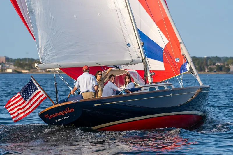 Tranquilo Yacht Photos Pics Sailing on a 2008 Morris Yachts M36 with colorful sails and American flag.