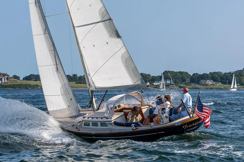 Tranquilo Yacht Photos Pics 2008 Morris Yachts M36 sailing with American flag on a sunny day.