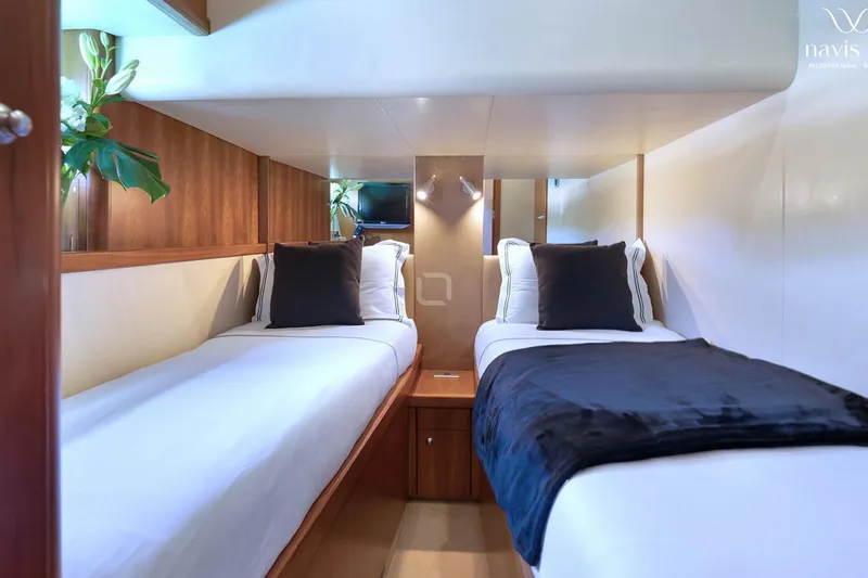  Yacht Photos Pics Luxurious twin cabin interior of 2008 Sunseeker Predator 72 yacht, featuring elegant decor.