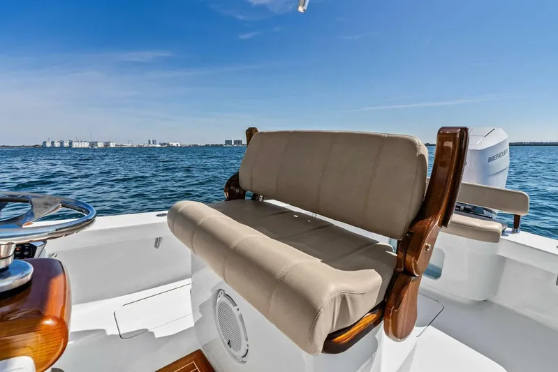  Yacht Photos Pics 2024 Custom Center Console High Ground Boatworks on open water, featuring comfortable seating.