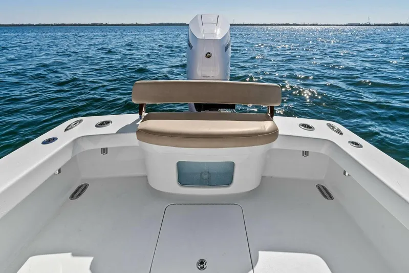  Yacht Photos Pics 2024 Custom Center Console High Ground Boatworks on open water, featuring a sleek seating area.