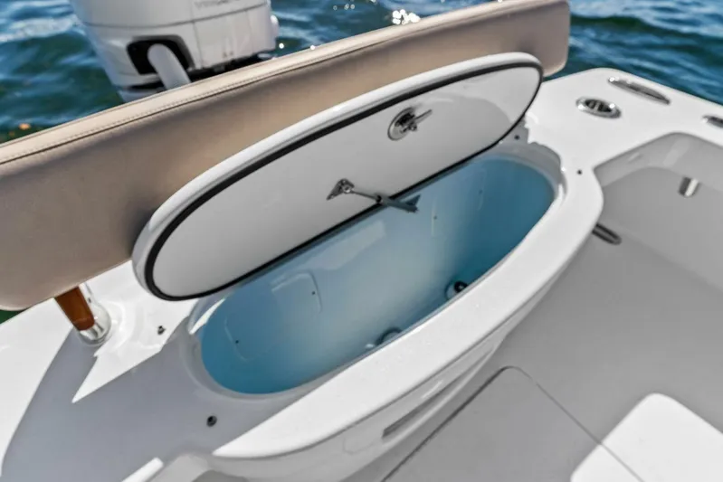  Yacht Photos Pics 2024 Custom Center Console High Ground Boatworks with open storage compartment on deck.