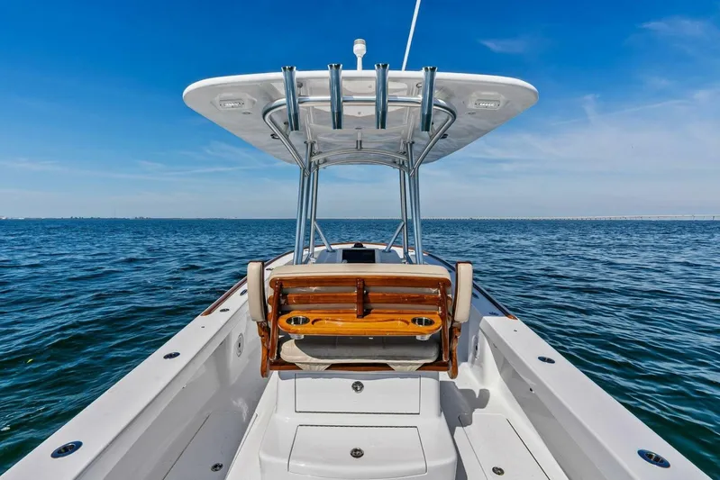  Yacht Photos Pics 2024 Custom Center Console High Ground Boatworks on open water, clear sky.
