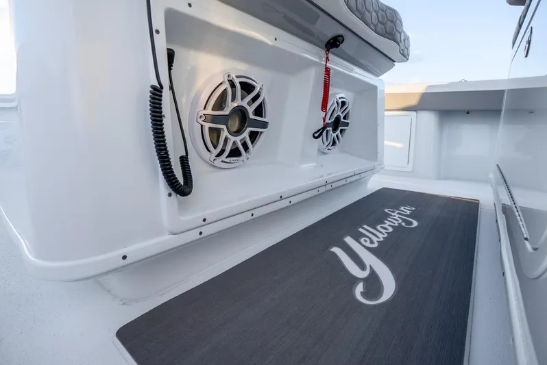  Yacht Photos Pics 2024 Yellowfin 39 boat interior with speakers and branded mat.