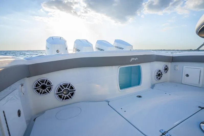  Yacht Photos Pics 2024 Yellowfin 39 boat deck with speakers and Mercury engines at sea.