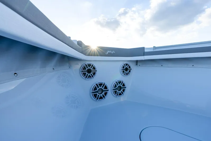  Yacht Photos Pics 2024 Yellowfin 39 boat interior with speakers and sunlight.