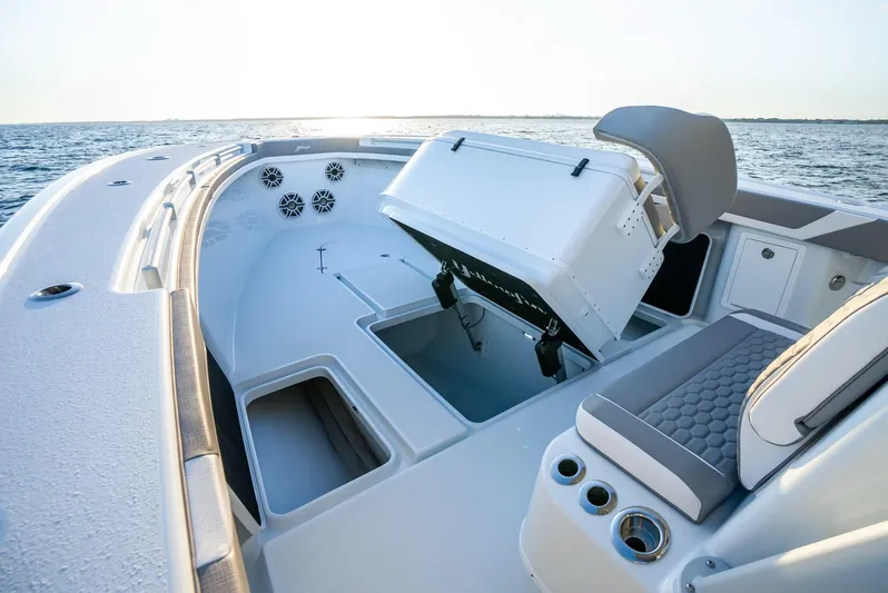  Yacht Photos Pics 2024 Yellowfin 39 boat interior with open storage, seating, and ocean view.